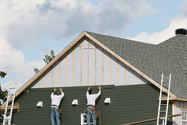 Professional Siding Installation technician working in Shreve, OH